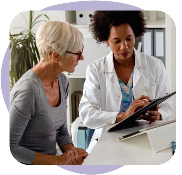 A Doctor Explaining What Breast Cancer Is to a Patient